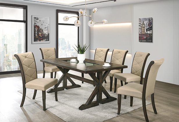 A dining room table and chairs set in a white room.