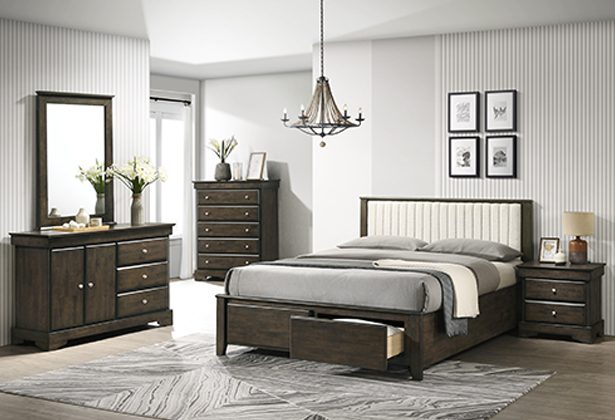 A bedroom with a bed, dresser and mirror.
