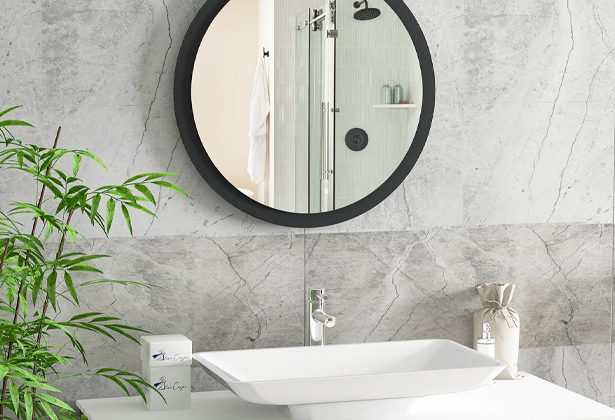 A bathroom with a sink and mirror in it