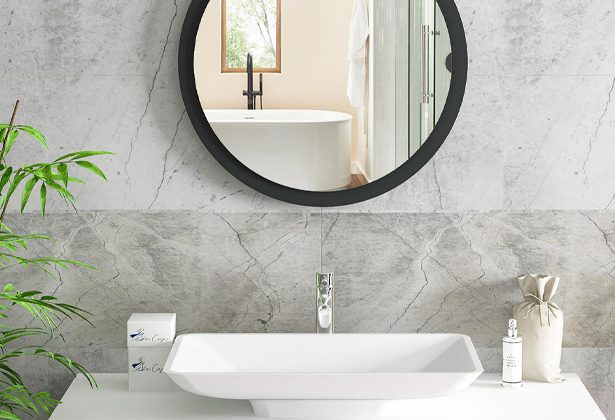 A bathroom with a sink and mirror in it